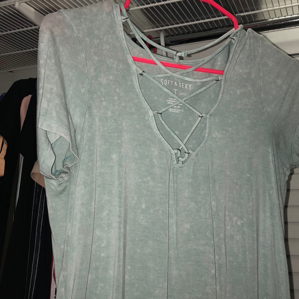 AE baby blue cross cross shirt